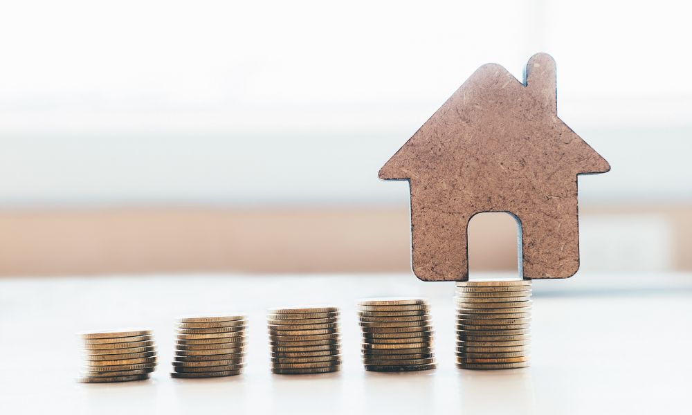 Simbolo casa e monete, a riprendere la tematica dei mutui a gennaio.